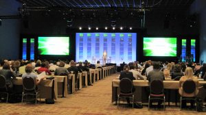 Picture of Audience listening to a lecture presented in a corporate seminar hosted by Event Management Company name Kiyoh